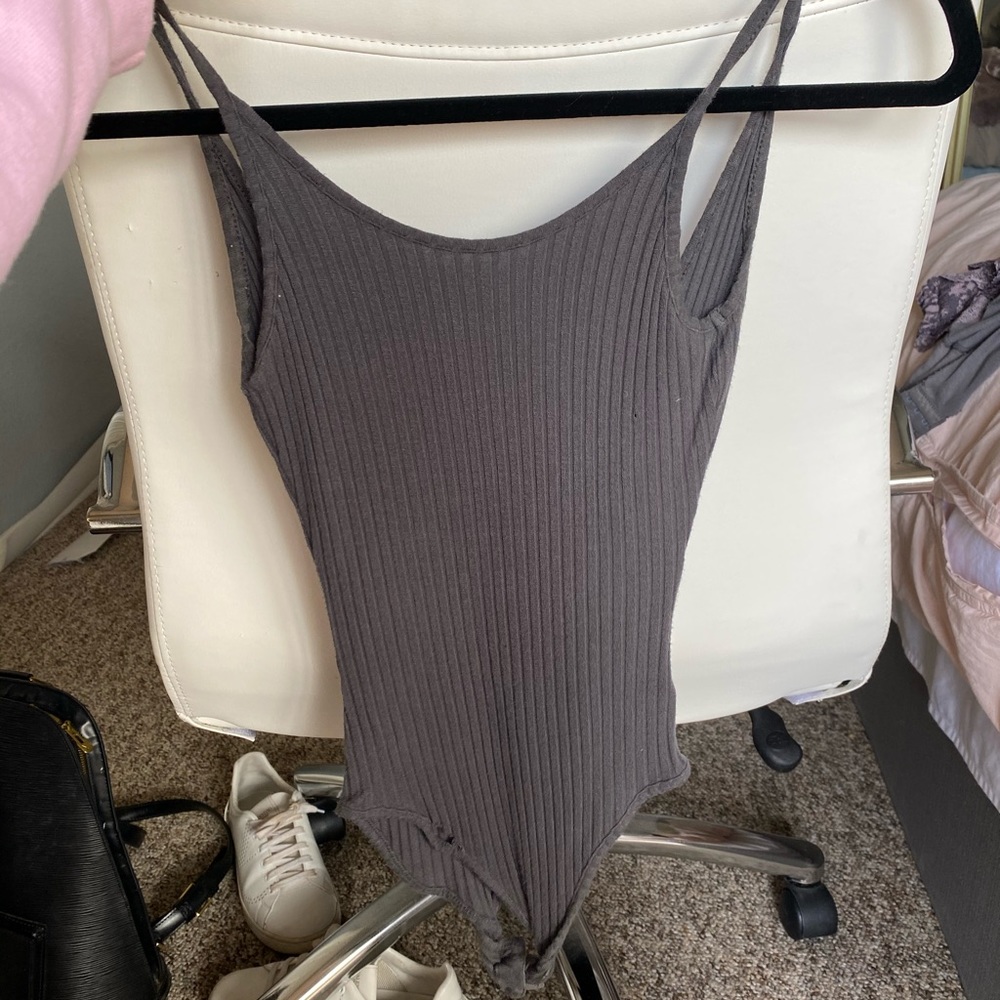 Grey body suit